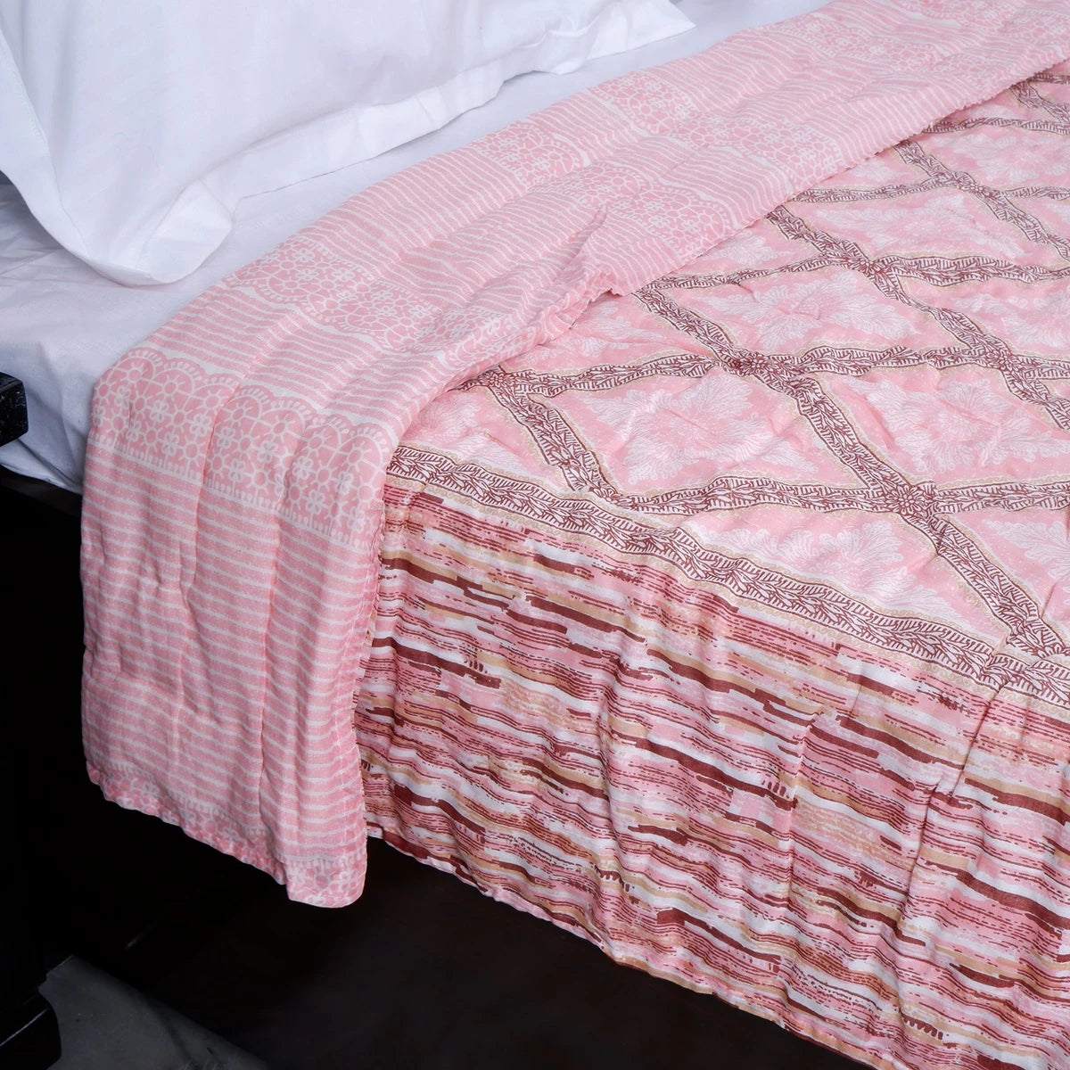 Jaipuri cotton quilt single bed in soft pink with traditional patterns and intricate detailing